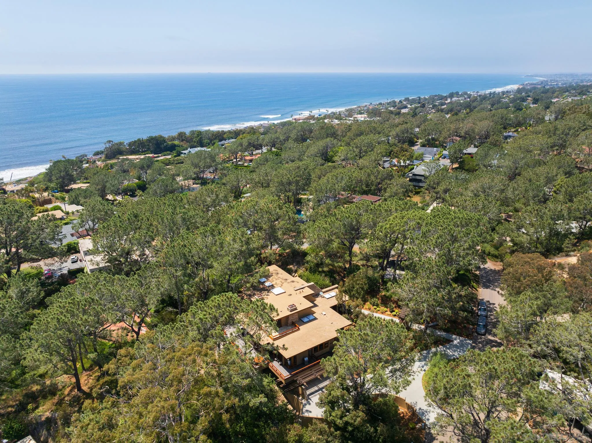 456 Hidden Pines Lane Del Mar, CA 92014 - Photo 7 of 55 an aerial view of a city with ocean view