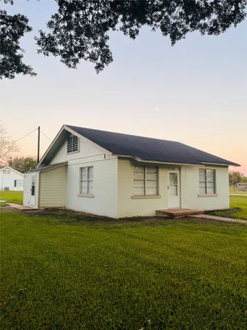 a house view with a garden space
