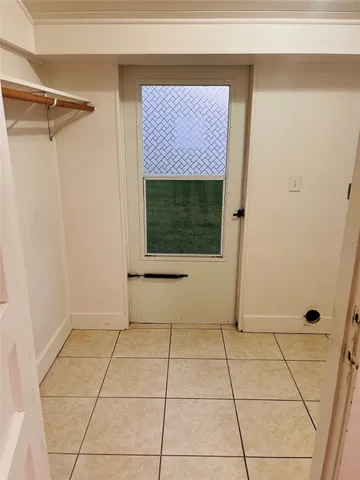 a view of a utility room with a fireplace