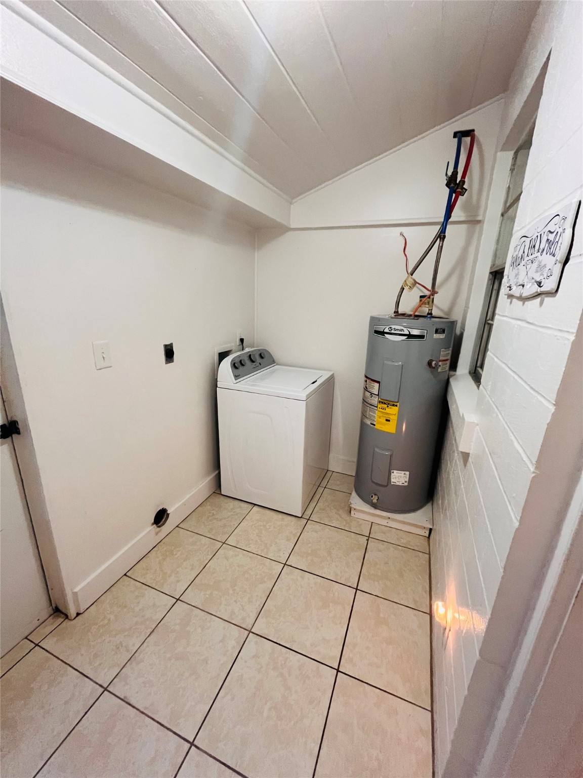 1583 Dover Street, Unit 7 Boling, TX 77420 - Photo 10 of 19 a utility room with cabinets