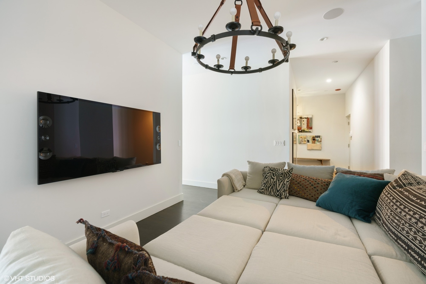 747 North Clark Street, Unit 201 Chicago, IL 60654 - Photo 14 of 30 a living room with furniture and a flat screen tv