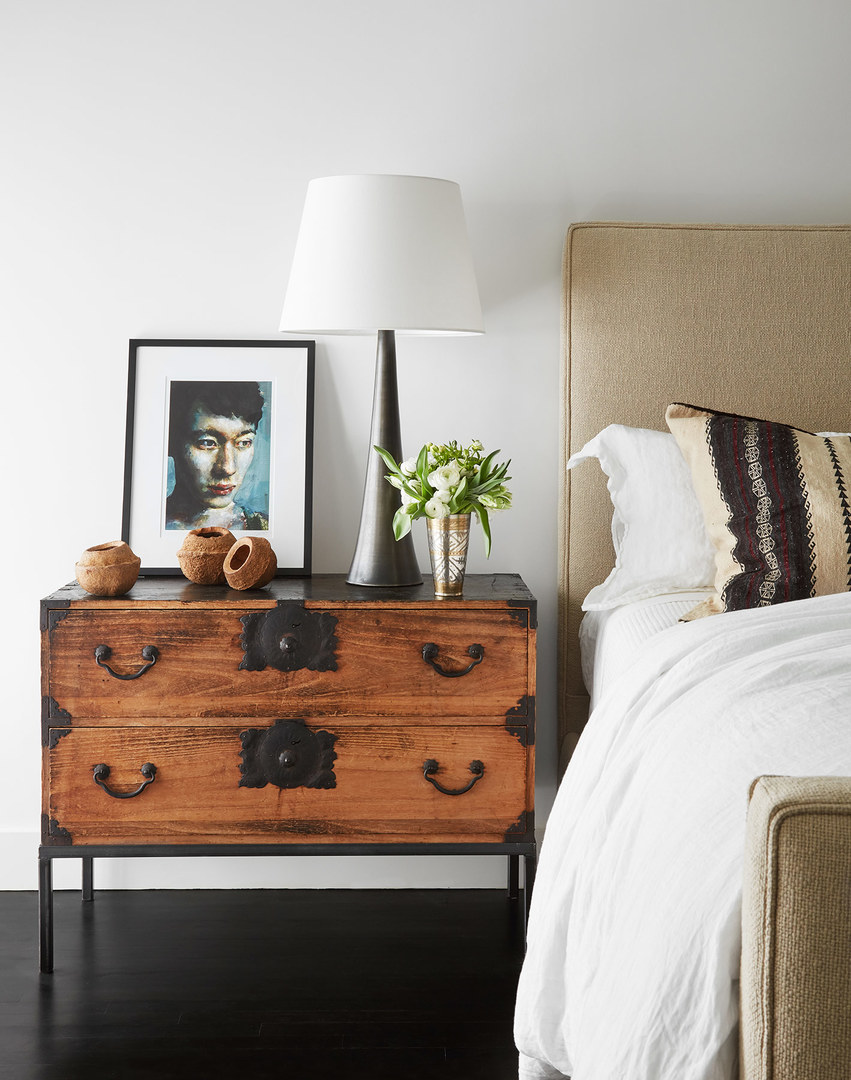 747 North Clark Street, Unit 201 Chicago, IL 60654 - Photo 18 of 30 a room with a bed and a dresser