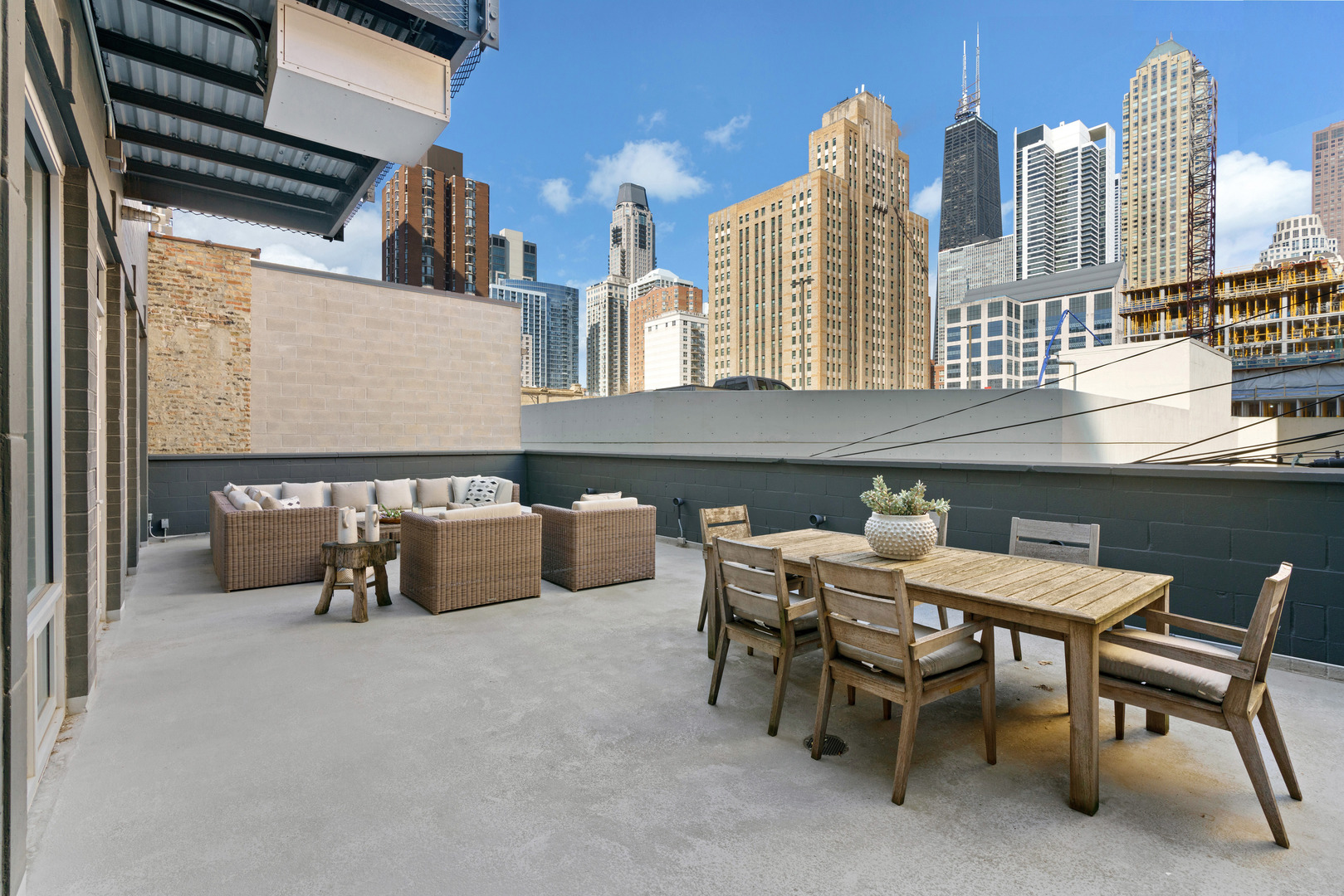 747 North Clark Street, Unit 201 Chicago, IL 60654 - Photo 2 of 30 a view of dinning table and chairs in patio