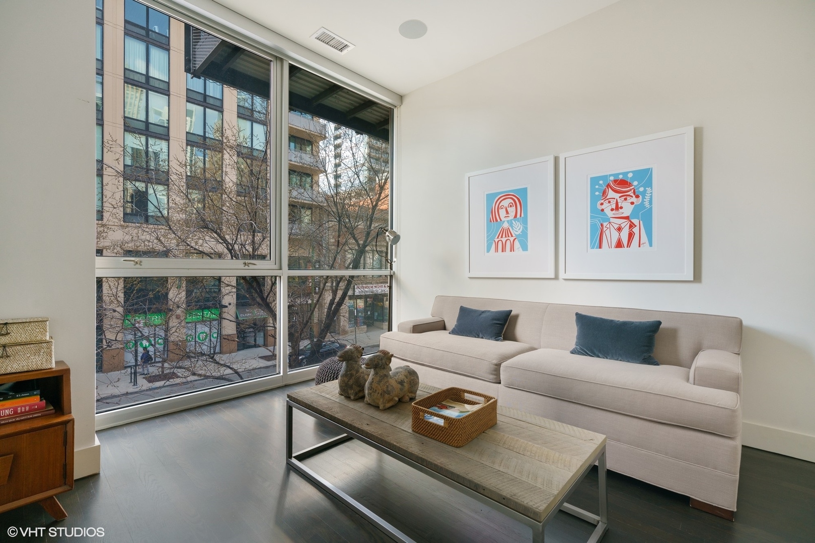 747 North Clark Street, Unit 201 Chicago, IL 60654 - Photo 24 of 30 a living room with furniture and a floor to ceiling window