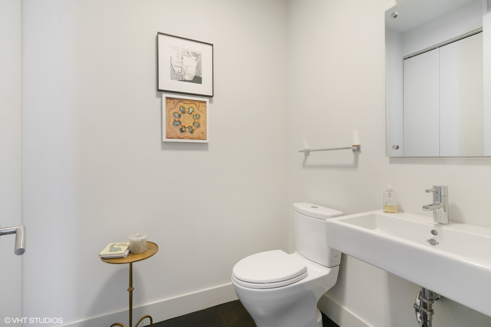 747 North Clark Street, Unit 201 Chicago, IL 60654 - Photo 25 of 30 a bathroom with a toilet and a sink
