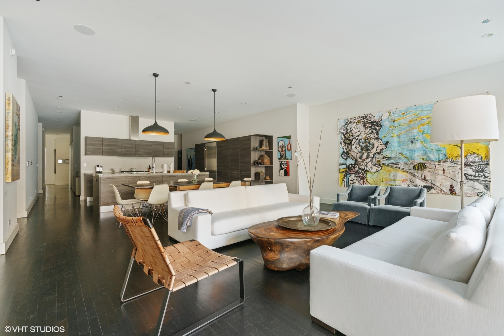 747 North Clark Street, Unit 201 Chicago, IL 60654 - Photo 5 of 30 a living room with furniture and a view of kitchen chandelier