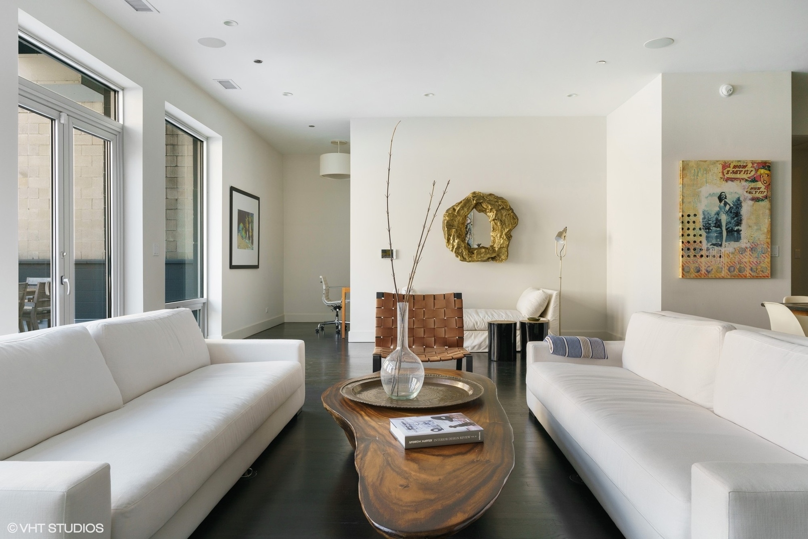 747 North Clark Street, Unit 201 Chicago, IL 60654 - Photo 10 of 30 a living room with furniture and wooden floor