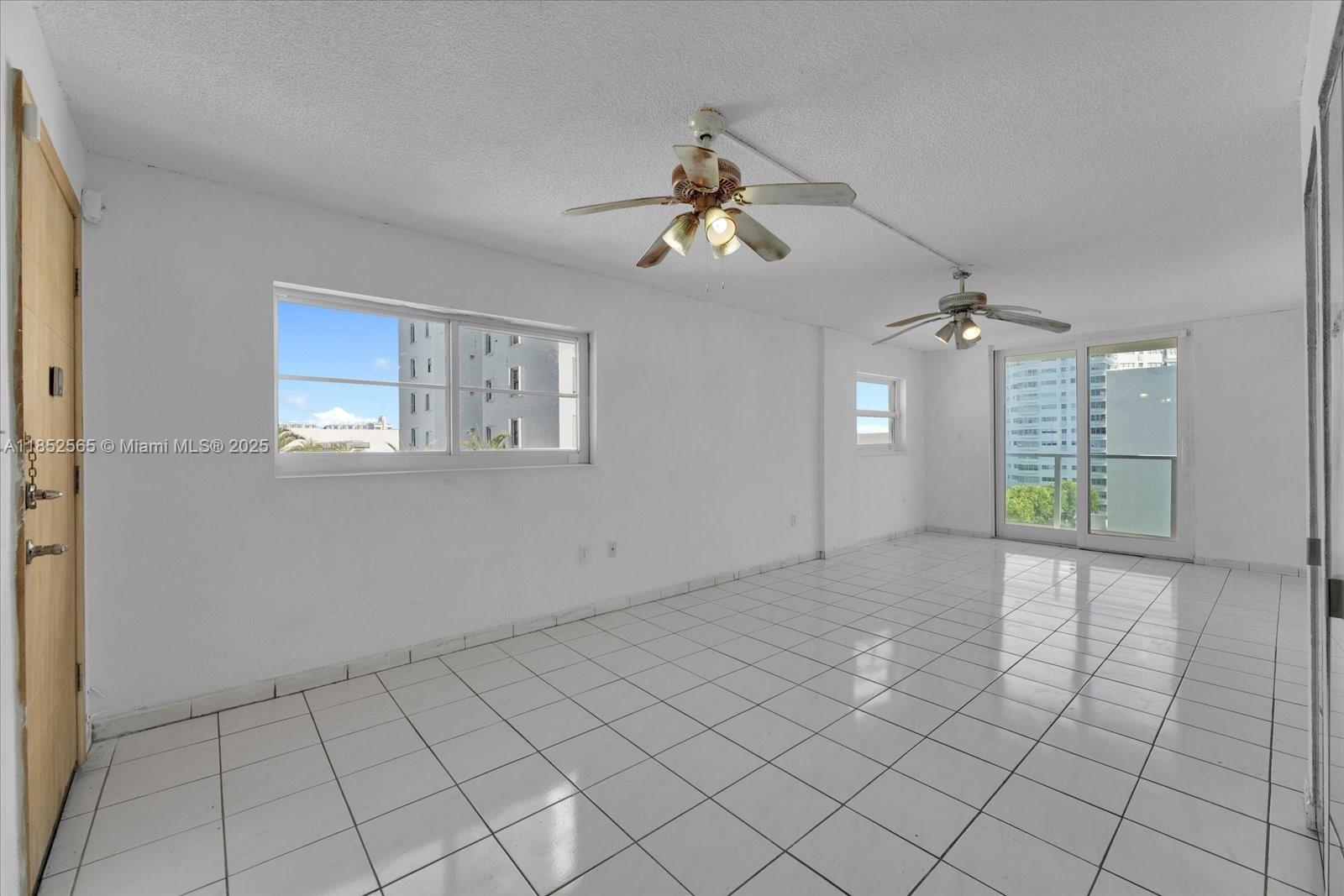 1750 James Avenue, Unit 7L Miami Beach, FL 33139 - Photo 3 of 27 a view of an empty room with a window