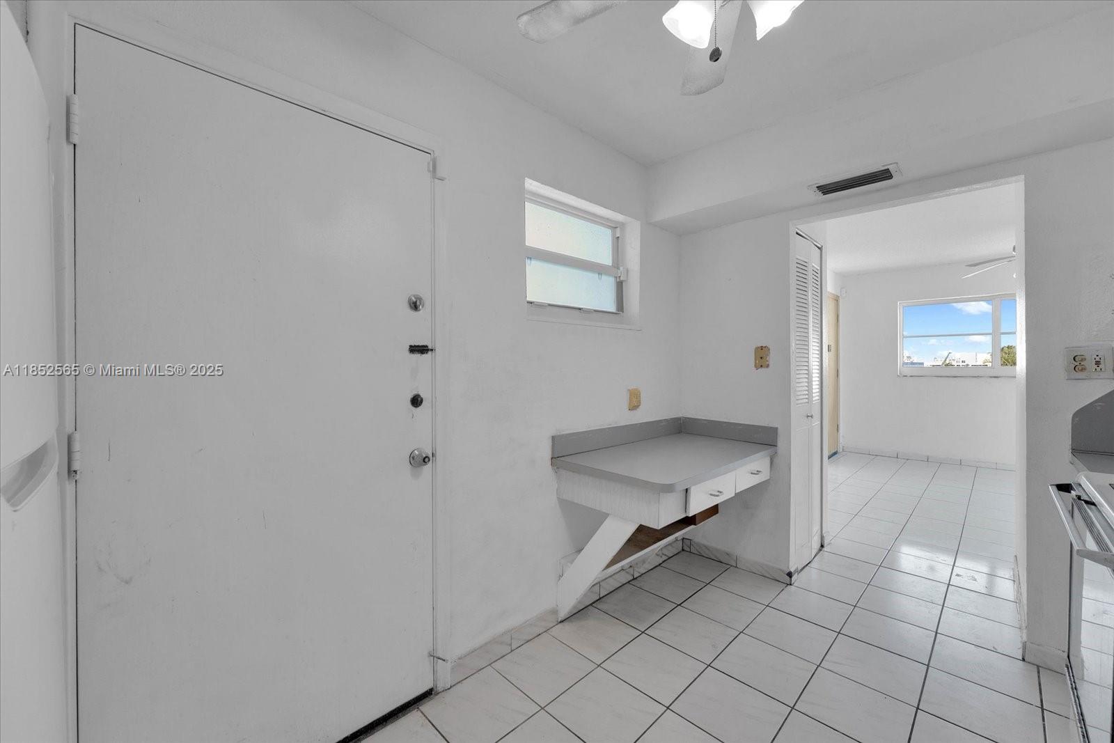 1750 James Avenue, Unit 7L Miami Beach, FL 33139 - Photo 8 of 27 a room with furniture and window