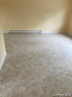 1455 East Forks Road Bay Shore, NY 11706 - Photo 2 of 7 a view of an empty room