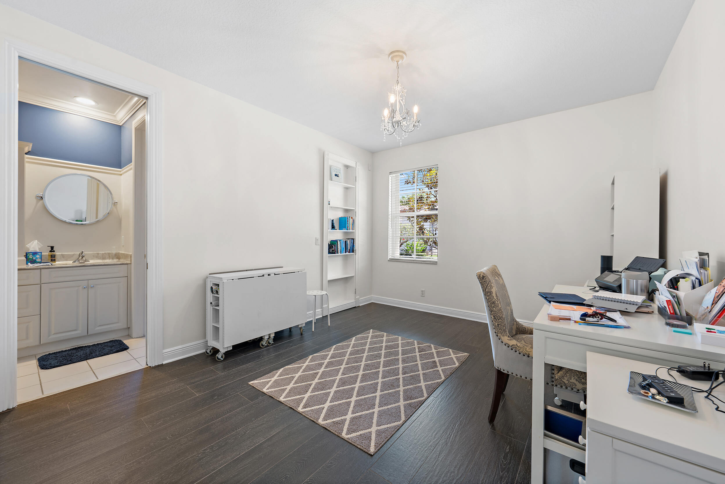 105 Segovia Way Jupiter, FL 33458 - Photo 19 of 33 a workspace with furniture and window