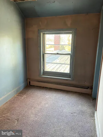 an empty room with closet