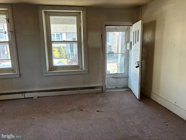an empty room with windows