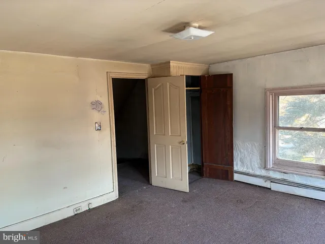 a view of a room that has window in it