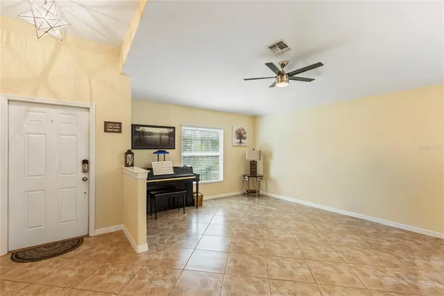 a view of a livingroom with a flat screen tv