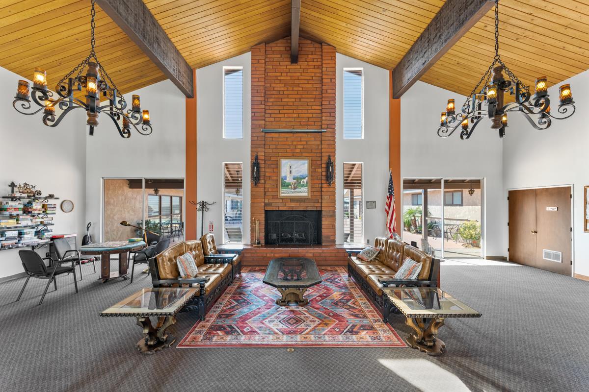 128 Don Felipe Ojai, CA 93023 - Photo 28 of 35 a living room filled with furniture gym equipment and a large window