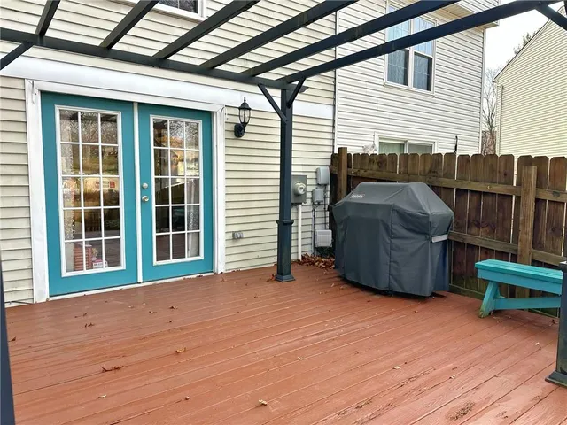 a view of a deck with furniture