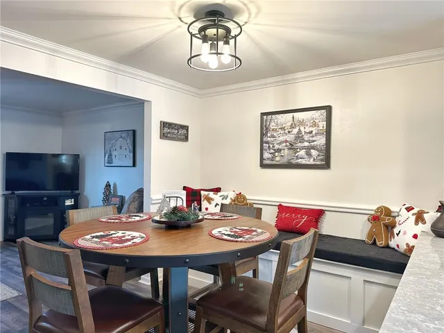 a view of a dining room with furniture