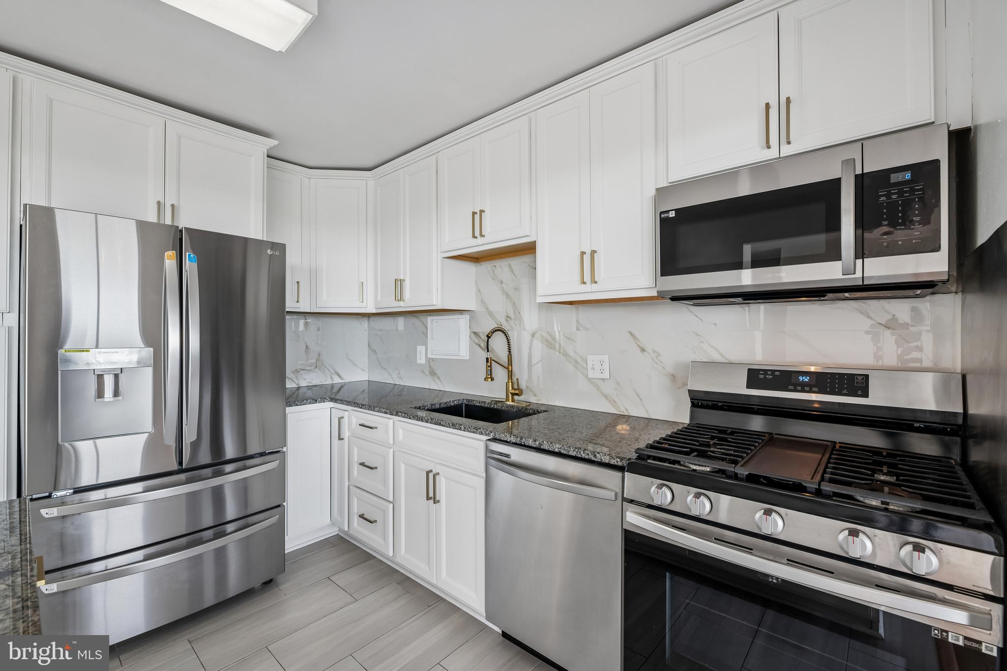 1836 Metzerott Road, Unit 2002 Hyattsville, MD 20783 - Photo 23 of 45 Kitchen