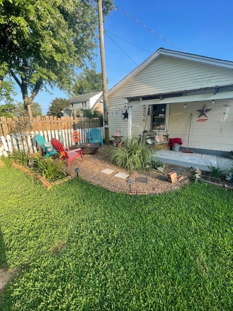 616 1st Street Lawrenceburg, TN 38464 - Photo 12 of 49 a view of a house with a yard