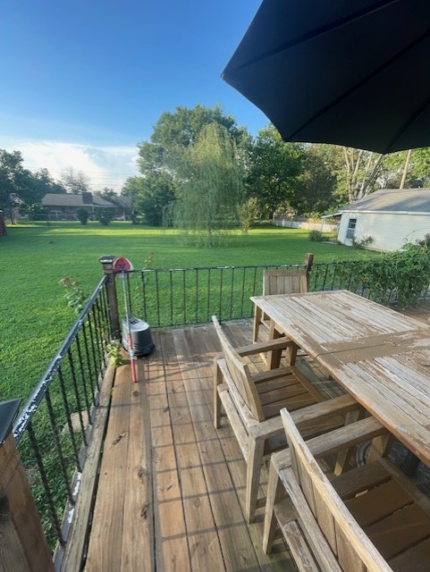 616 1st Street Lawrenceburg, TN 38464 - Photo 19 of 49 a view of a chairs and table on the terrace