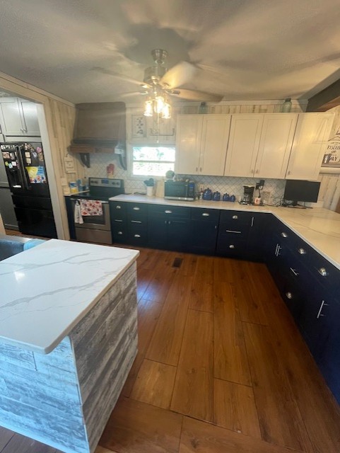 616 1st Street Lawrenceburg, TN 38464 - Photo 21 of 49 a kitchen with a sink and cabinets