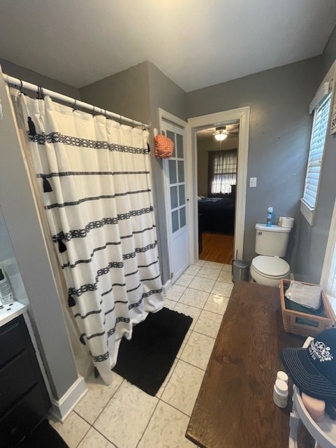 616 1st Street Lawrenceburg, TN 38464 - Photo 24 of 49 a bathroom with a toilet and a shower