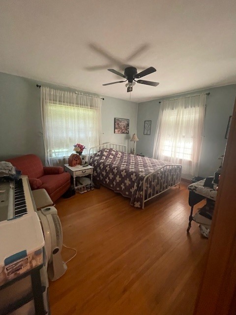 616 1st Street Lawrenceburg, TN 38464 - Photo 32 of 49 a bedroom with furniture and a window