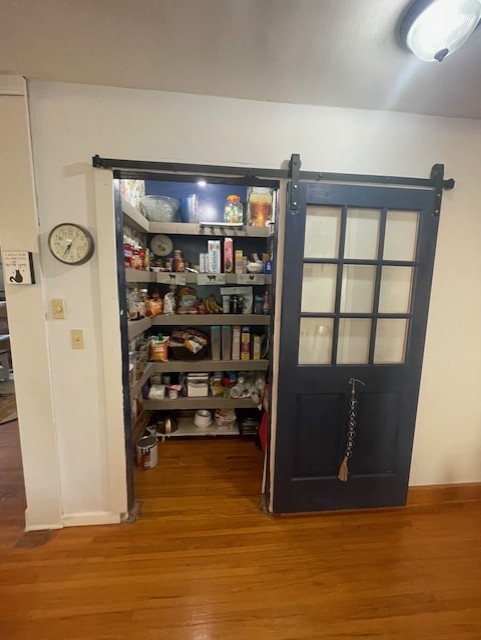 616 1st Street Lawrenceburg, TN 38464 - Photo 40 of 49 a view of empty room with wooden floor and cabinet