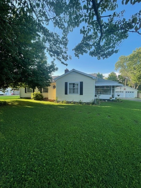 616 1st Street Lawrenceburg, TN 38464 - Photo 4 of 49 a view of a house with a big yard