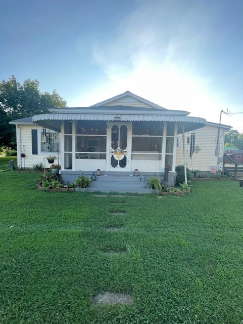 616 1st Street Lawrenceburg, TN 38464 - Photo 5 of 49 a front view of house with yard and green space