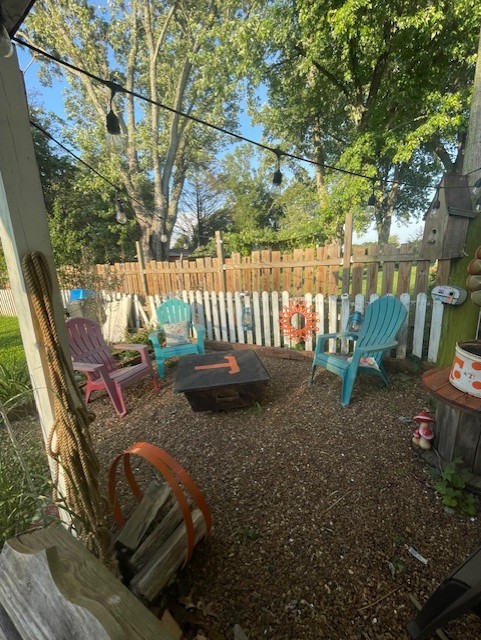 616 1st Street Lawrenceburg, TN 38464 - Photo 7 of 49 a view of a backyard with sitting area