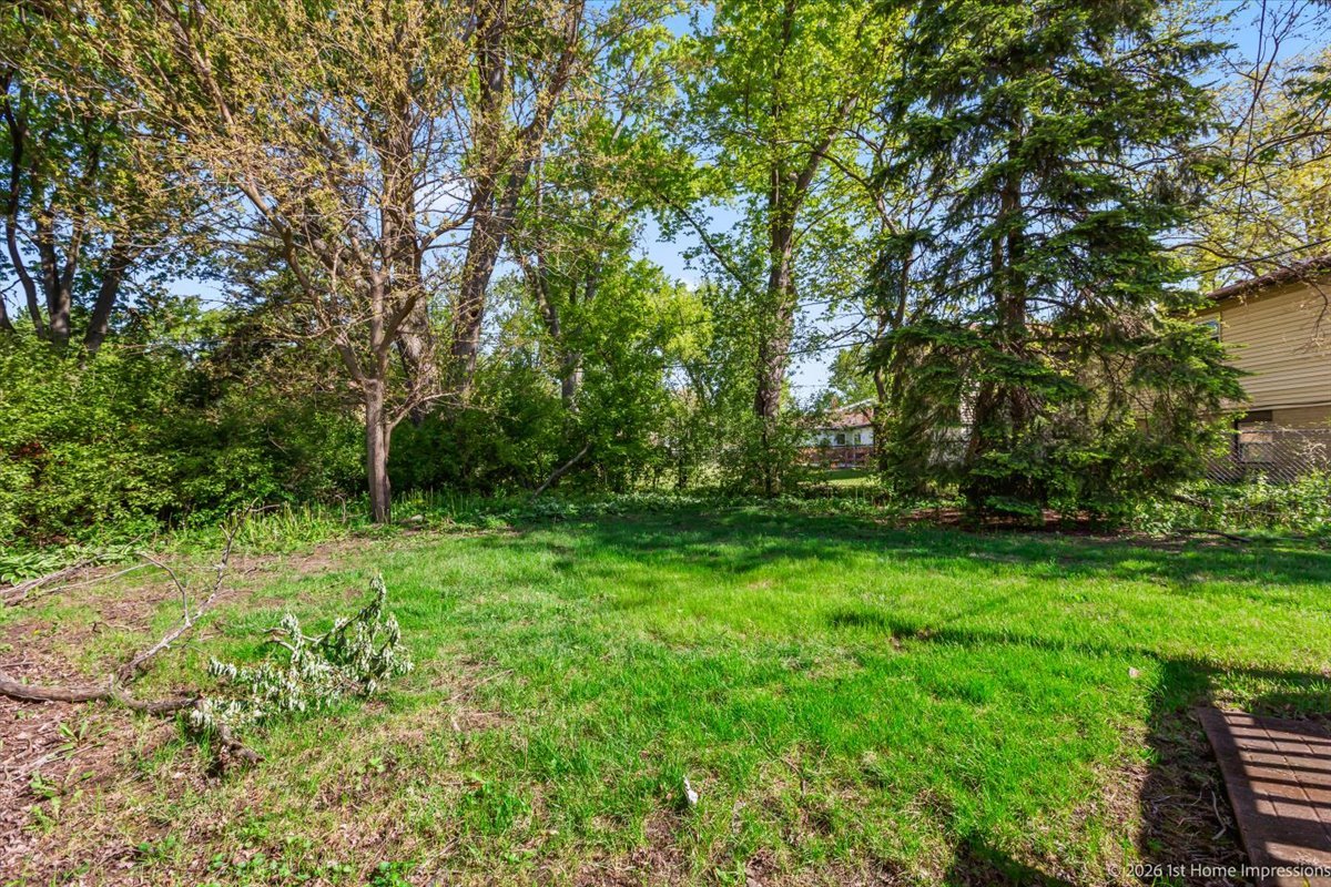18847 May Avenue Homewood, IL 60430 - Photo 25 of 26 a view of outdoor space with deck and yard