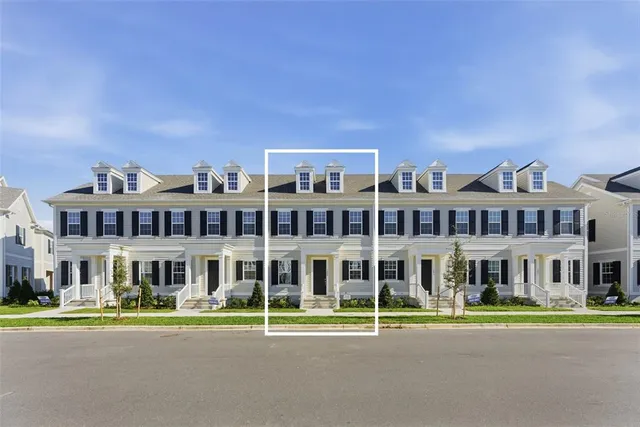 a front view of a house with a swimming pool