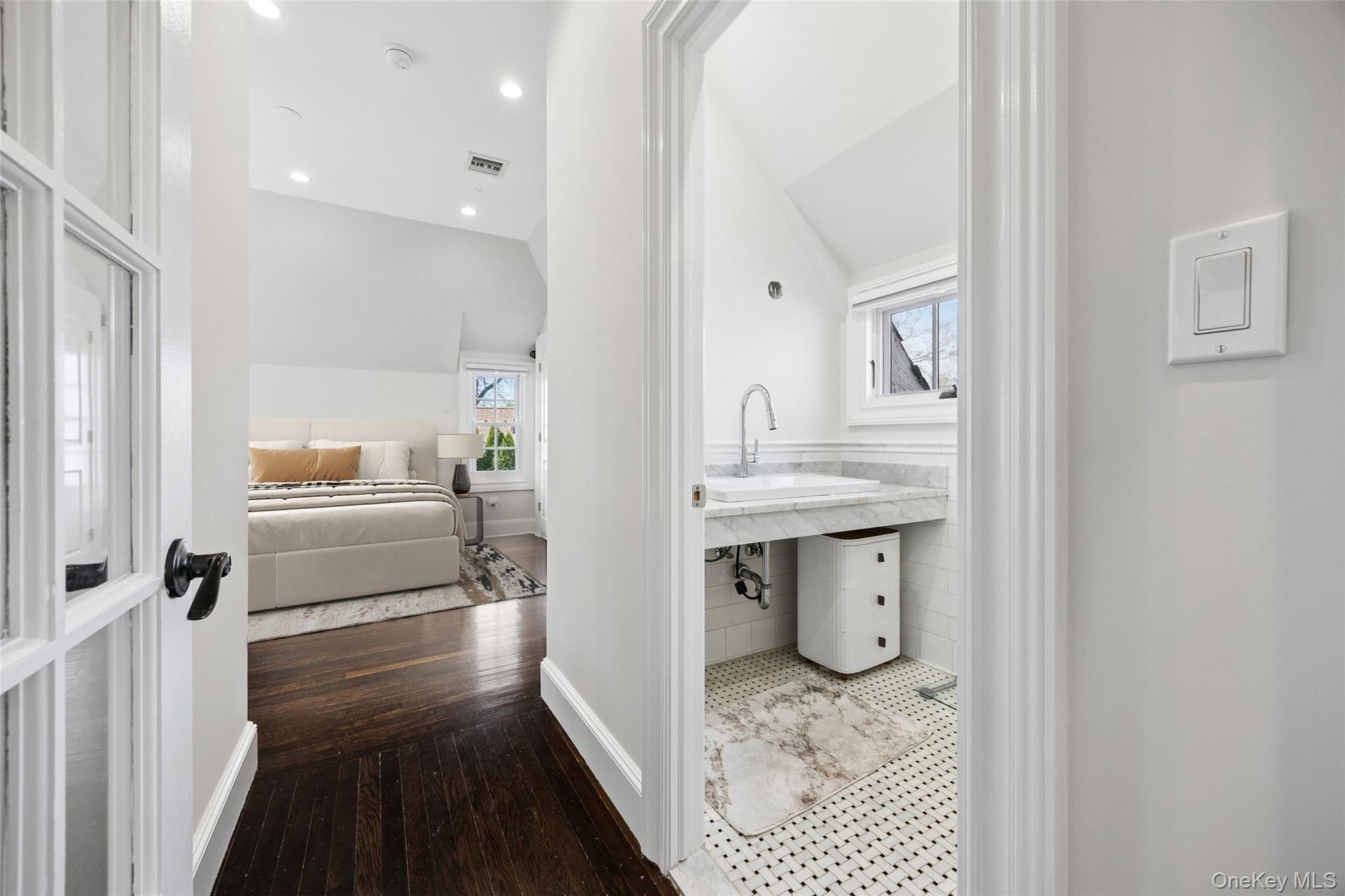 216 Beverly Road Queens, NY 11363 - Photo 14 of 50 a bathroom with a sink and mirror