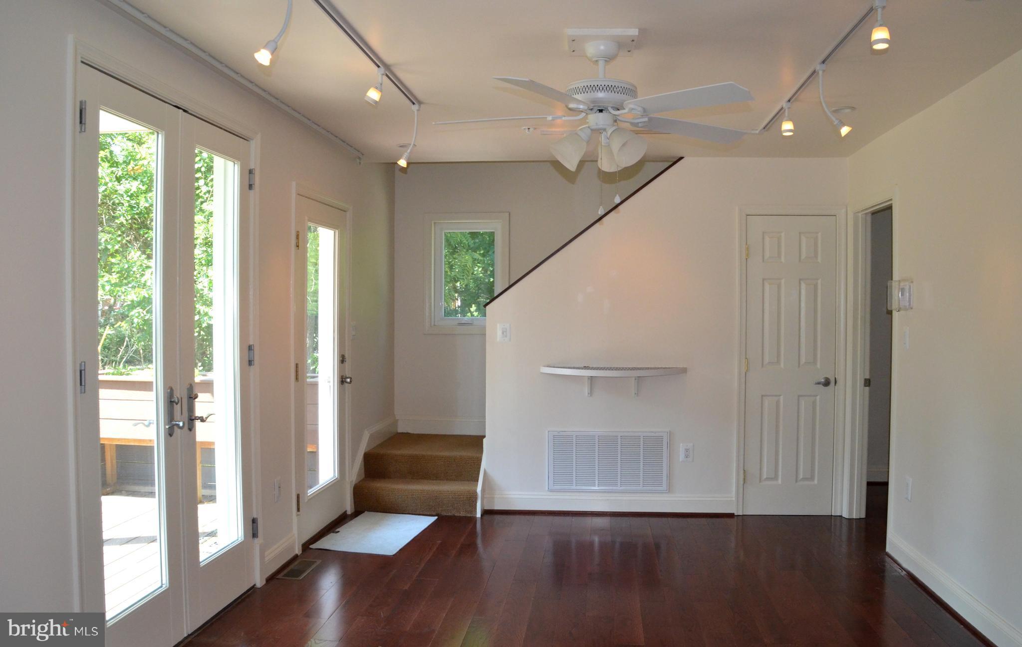 7370 Station Road Newcomb, MD 21653 - Photo 11 of 30 a view of entryway with wooden floor