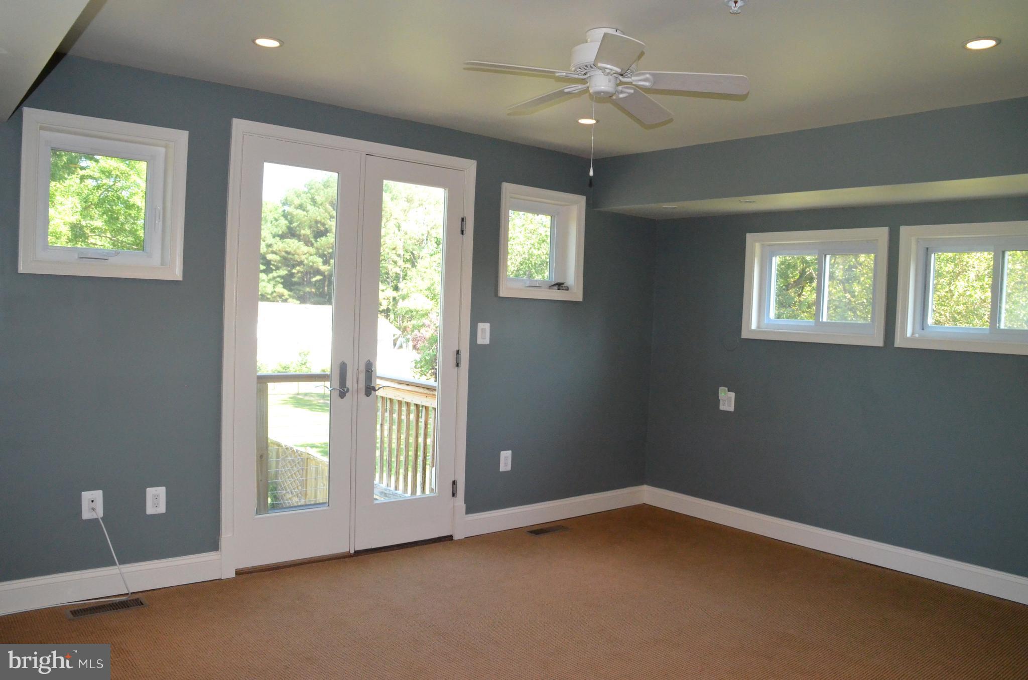 7370 Station Road Newcomb, MD 21653 - Photo 18 of 30 a view of an empty room with a window