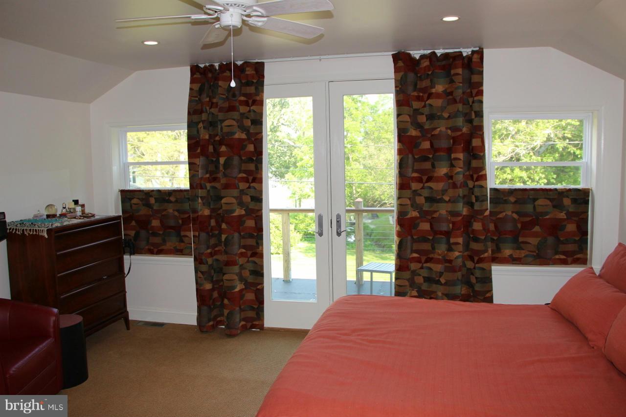 7370 Station Road Newcomb, MD 21653 - Photo 20 of 30 a bedroom with bed and a window