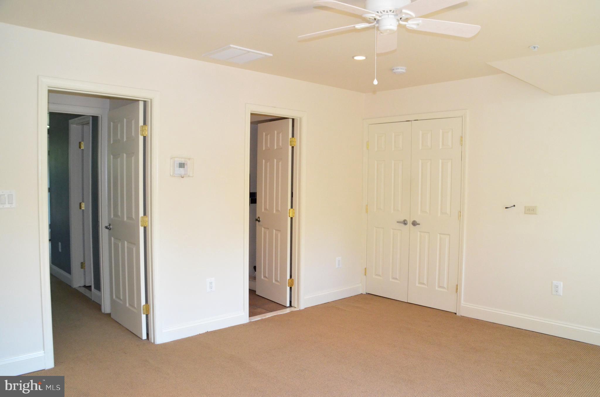 7370 Station Road Newcomb, MD 21653 - Photo 21 of 30 a view of an empty room and chandelier fan