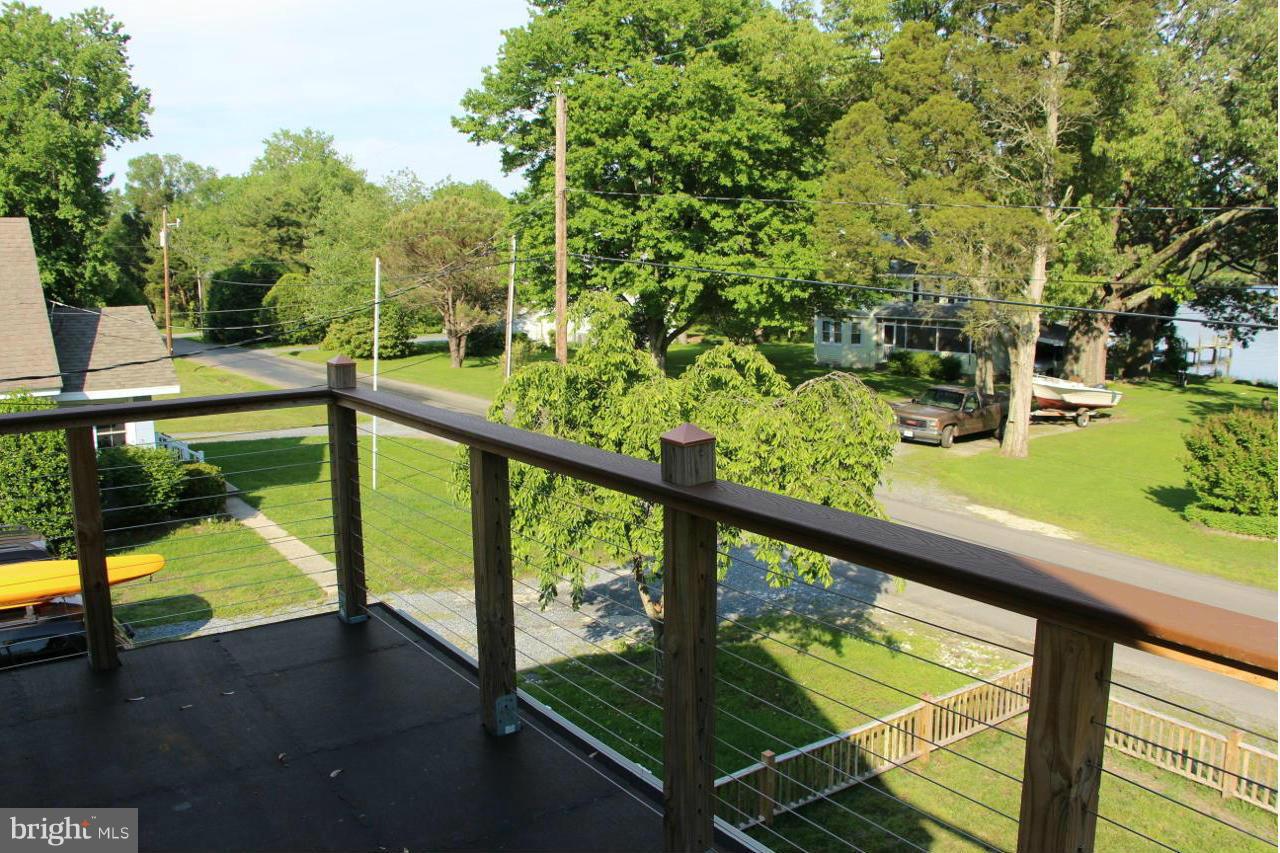 7370 Station Road Newcomb, MD 21653 - Photo 22 of 30 a view of swimming pool from a balcony