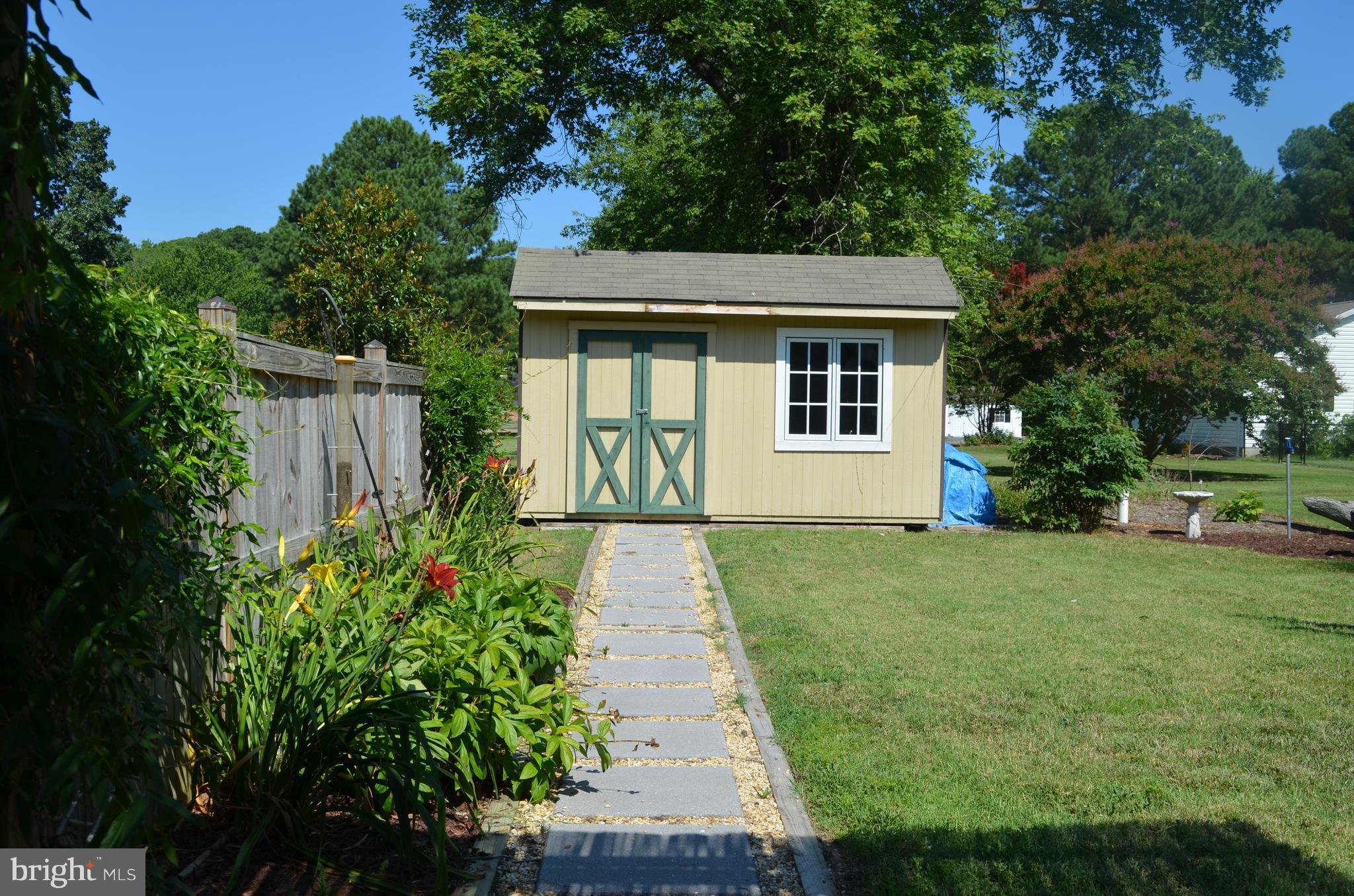 7370 Station Road Newcomb, MD 21653 - Photo 23 of 30 a front view of a house with a yard