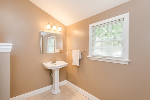 72 Ferry Road Salisbury, MA 01952 - Photo 13 of 30 a bathroom with a sink and a mirror