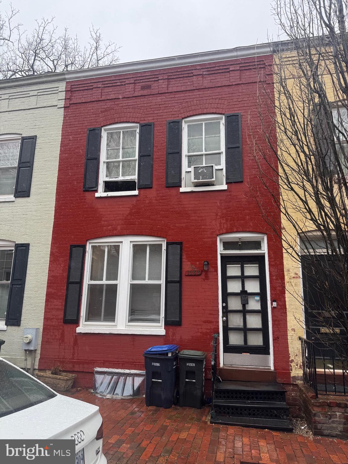 a red brick building that has lot of windows on it