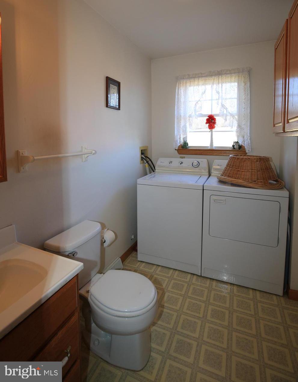 6316 Mt Phillip Road Frederick, MD 21703 - Photo 17 of 34 Laundry Room/Half Bath