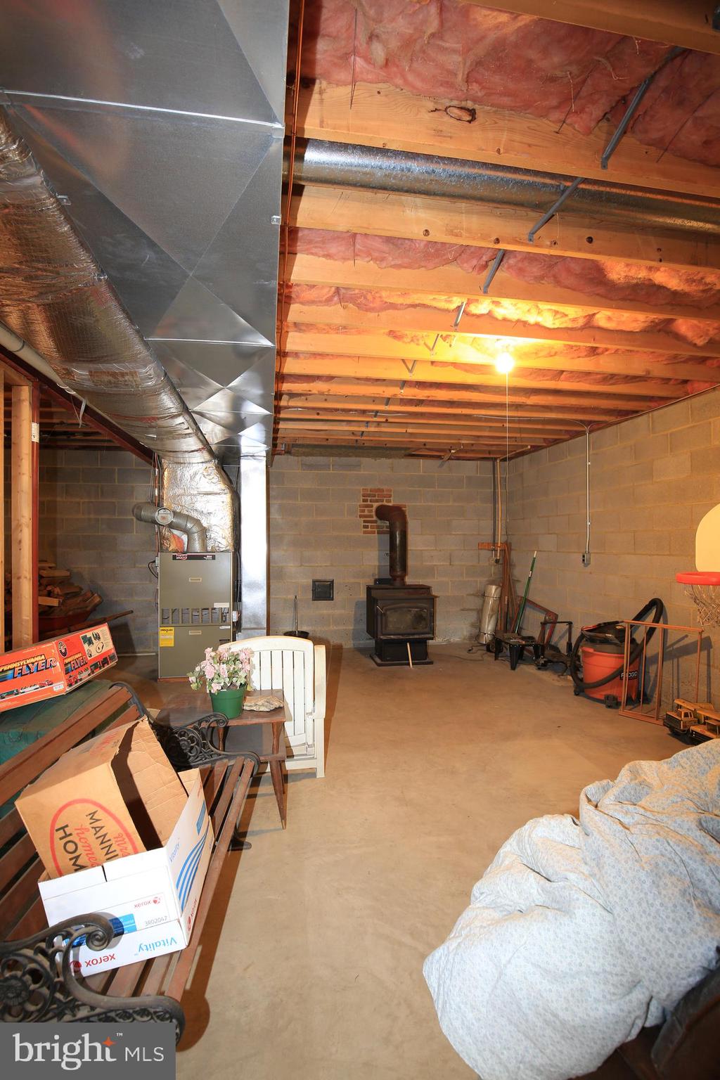 6316 Mt Phillip Road Frederick, MD 21703 - Photo 20 of 34 Basement w/Wood Burning Stove