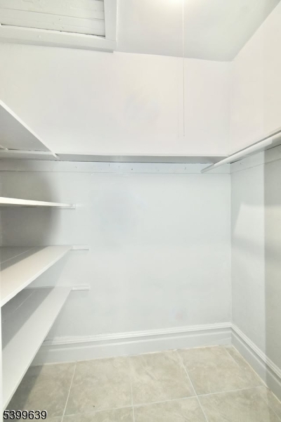 519 Clinton Place, Unit 2R Newark, NJ 07112 - Photo 13 of 14 a close up view of racks on the wall