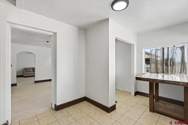 a view of room with furniture and a window