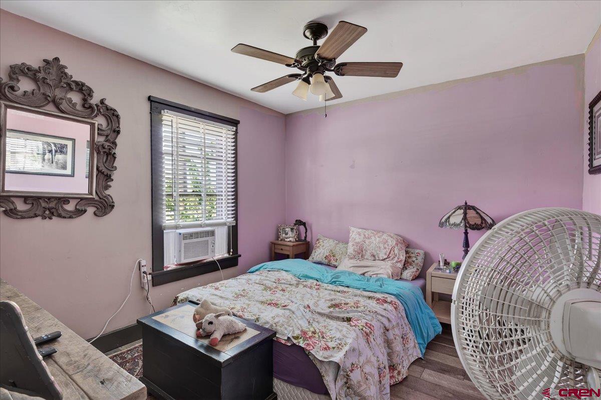 2091 Locust Road Montrose, CO 81401 - Photo 25 of 45 a bedroom with a bed and a window