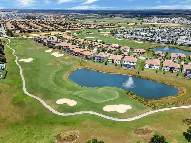 a view of a swimming pool with a lake view