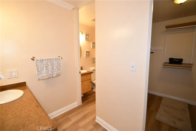 a view of a kitchen from the hallway